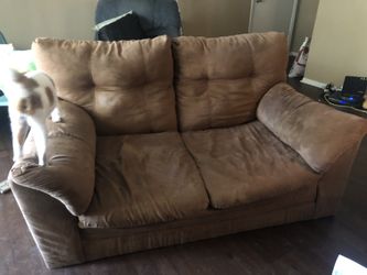 Brown loveseat