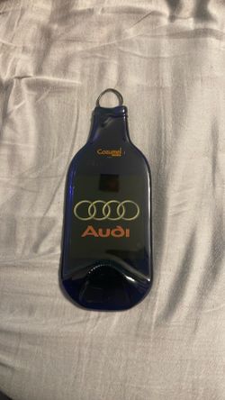 Flattened glass bottle Audi decor