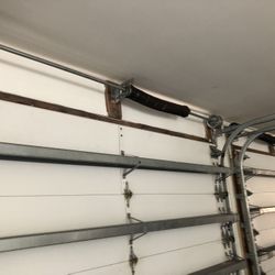 Garage Door Spring Opener Off Track Adjustment Replace And Parts 