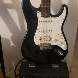 Electric Guitar Starcaster With Amplifier. 