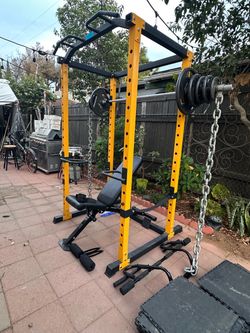 OLYMPIC POWER CAGE SQUAT RACK WITH OLYMPIC WEIGHTS AND BENCH