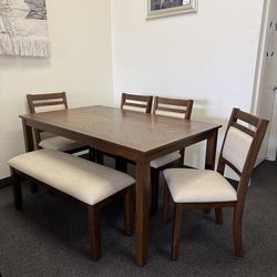 Dining table with 4 chairs and bench