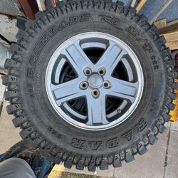 (4) - 235/85R16 Mt On 16” Jeep Wheels (5x100mm)