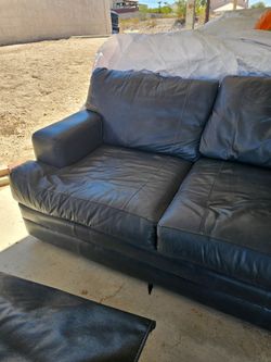 Blue leather loveseat/sofa