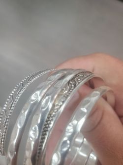 60 grams of sterling silver bangles