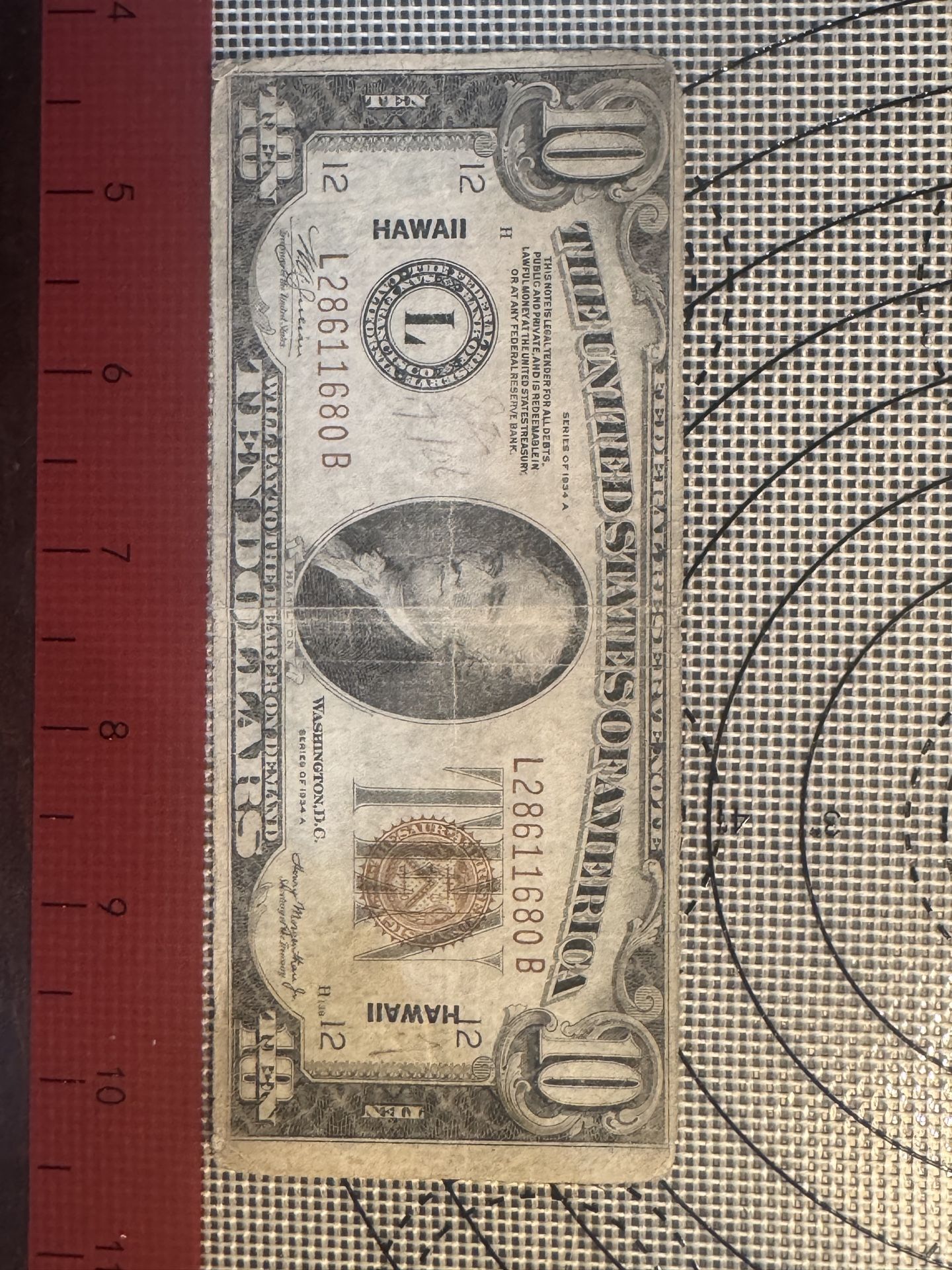This is a WWII-era 1934A ten-dollar bill with a 'Hawaii' overprint.