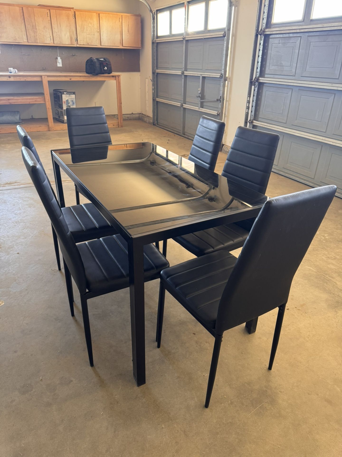 Glass Kitchen Table with 6 Upholstered Chairs and Faux Leather Cushions