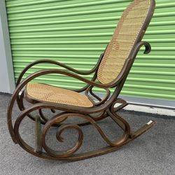 Vintage cane seat and wood rocking chair
