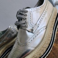 PRADA Metallic Silver Wing Tip Creeper Espadrille Brogue Loafer