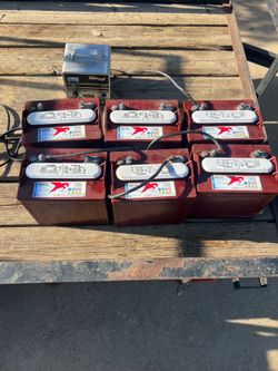 Trojan 8v batteries (Total of 6) with charger .