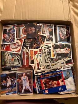 Box of sports cards holos and commons