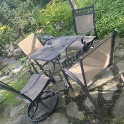 28” table and chairs 2 swivel chairs 24” tall
