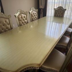 Dining Table, 8 Chairs In which Two Are Arm Chairs 