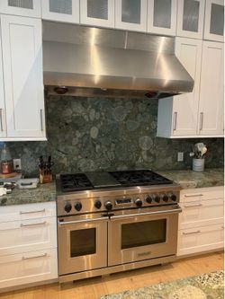 High-End Wolf 48” Dual Fuel Range + Matching Stainless Hood