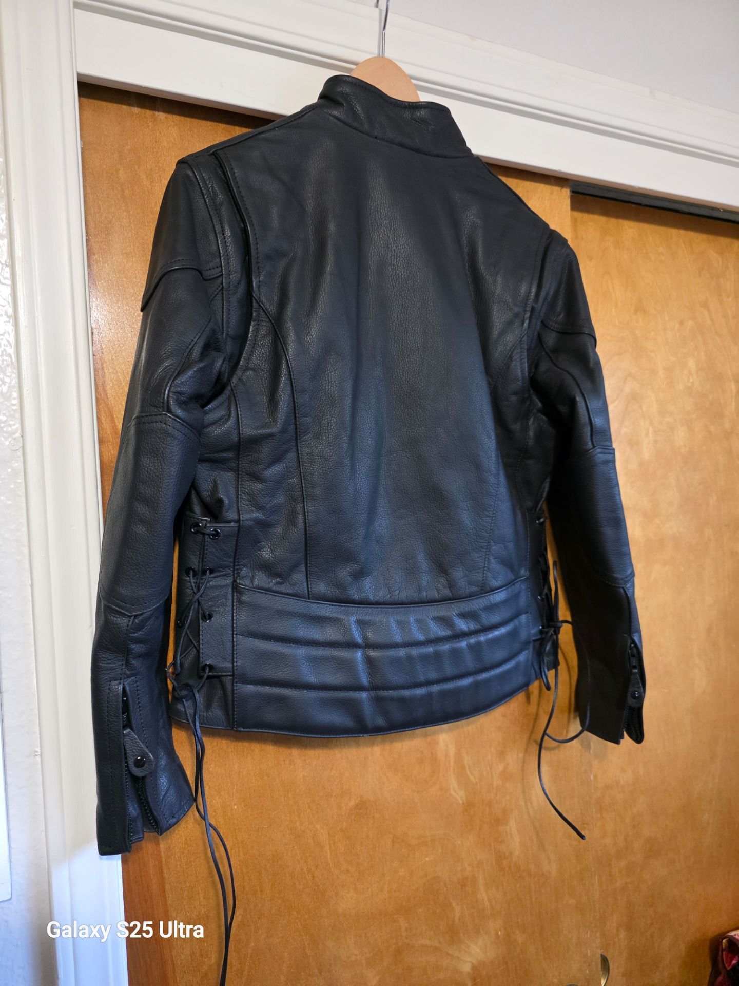 Genuine black leather ladies jacket. Size medium