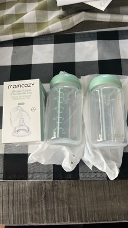 Open Box Momcozy bottles and caps