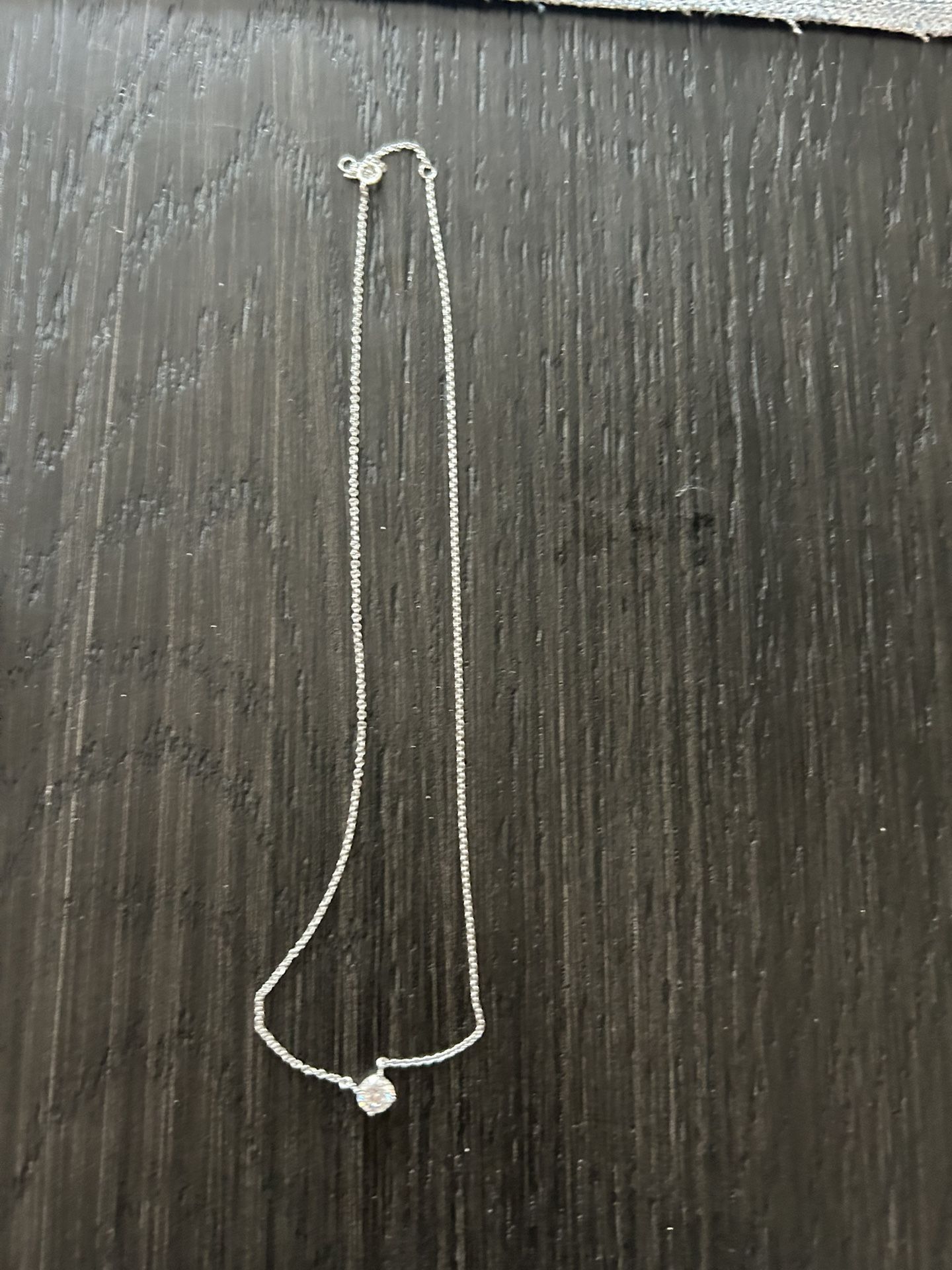 Silver necklace with rhinestone pendant