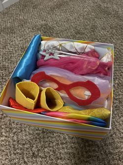 Box of children's play costumes