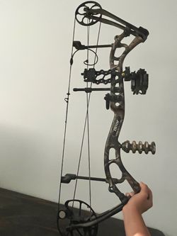 Compound bow with camouflage finish