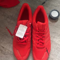 Red Adidas Shoes.  Brand New Black Mark On Left Shoe Size 13