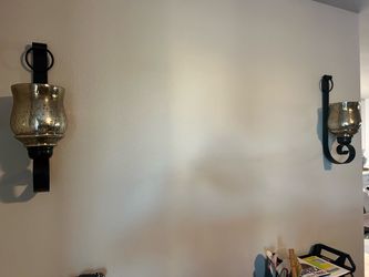Pair of metal and glass sconces
