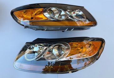 07-12 Hyundai Santa Fe Headlights; Black Housing With Amber Corners
