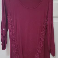Cable & Gauge women's high-low long-sleeve blouse in a berry or burgundy color with lace trim details. Womens Size Med