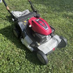 BRAND NEW NEVER HAD AN OIL IN THE ENGINE HONDA HRX -217 WITH BLADE CLUTCH. ALLOWING TO RUN LAWNMOWER WITHOUT SHUTTING IT  DOWN. COMES WITH INSTRUCTION