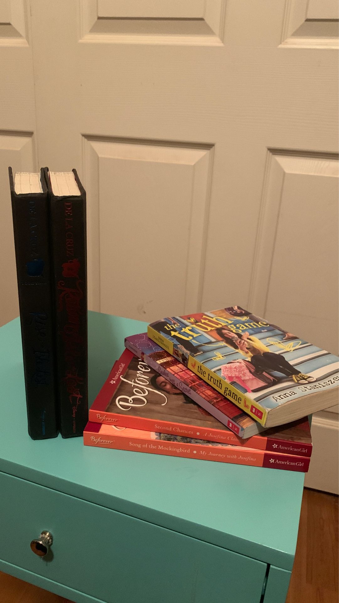 6 Tween/ teen book lot . Return to the isle of the lost, rise of the isle of the lost, the trust game, sealed with a secret, two American girl books