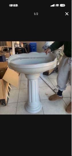White Pedestal Sink
