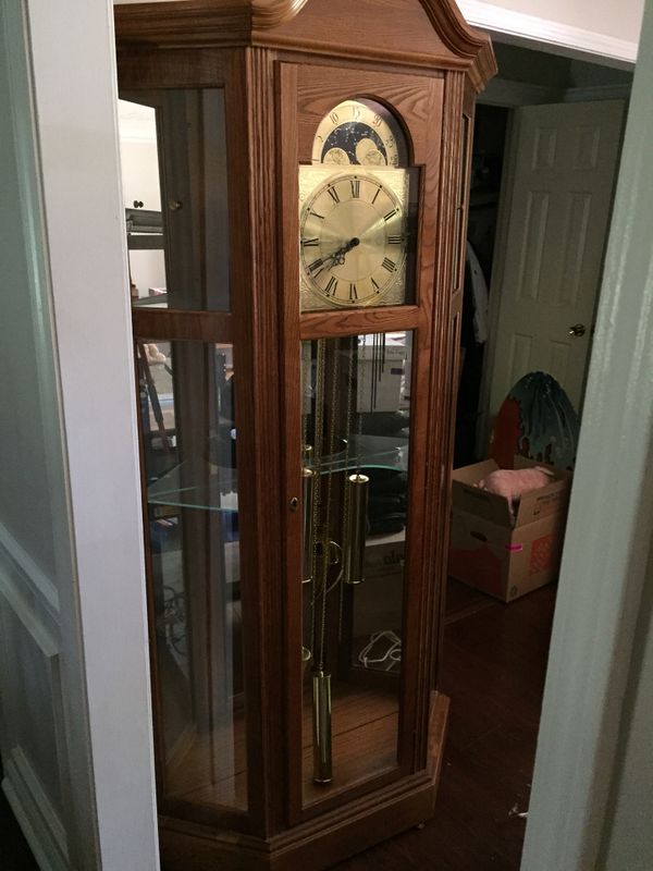 Ridgeway grandfather clock in lighted curio for Sale in Dacula