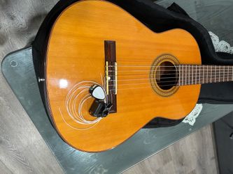 Acoustic guitar with case