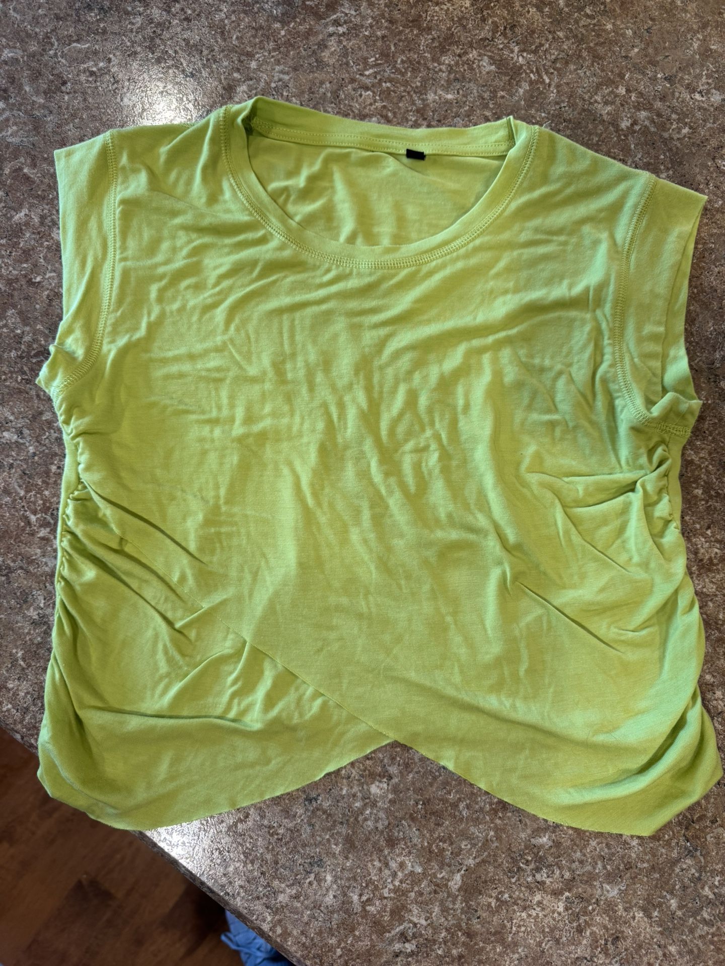 Woman’s east west Company, sexy workout top shipping available