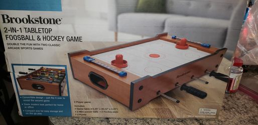 Brookstone 2 in 1 table top fooshball & hockey game