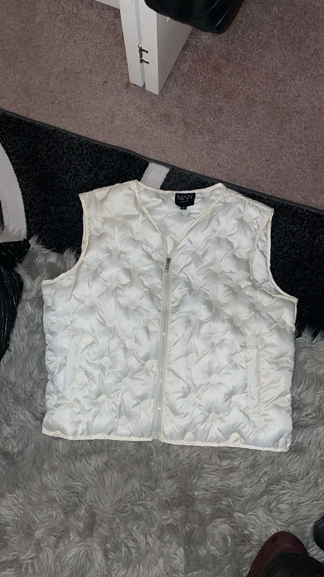 Men’s creme puffer vest 50$
