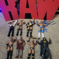 Lot Of 8 Rock Figures + RAW Sign