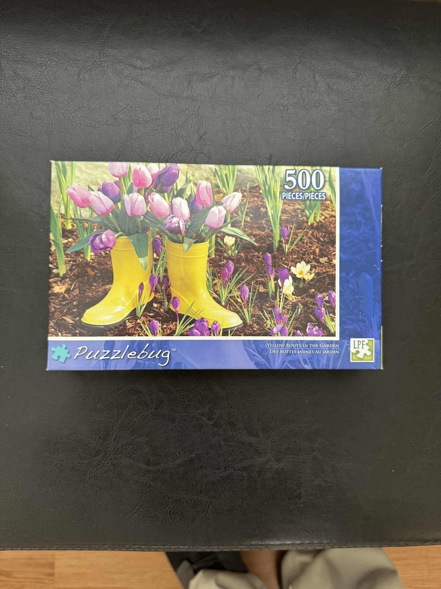 Puzzlebug 500 piece " Yellow Boots In The Garden"  Puzzle