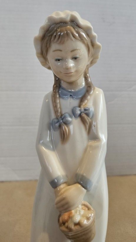 Lladro Figurine: NAO brand "Girl with Basket of Sweets." EXCELLENT COND.HTF.RARE