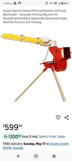 Barely used pitching machine, softballs, bag and misc