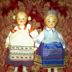 2 Vintage Russian ethnic clothing hard plastic dolls USSR 