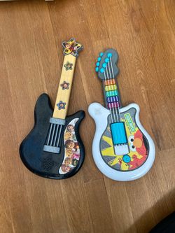 Kids pretend guitars
