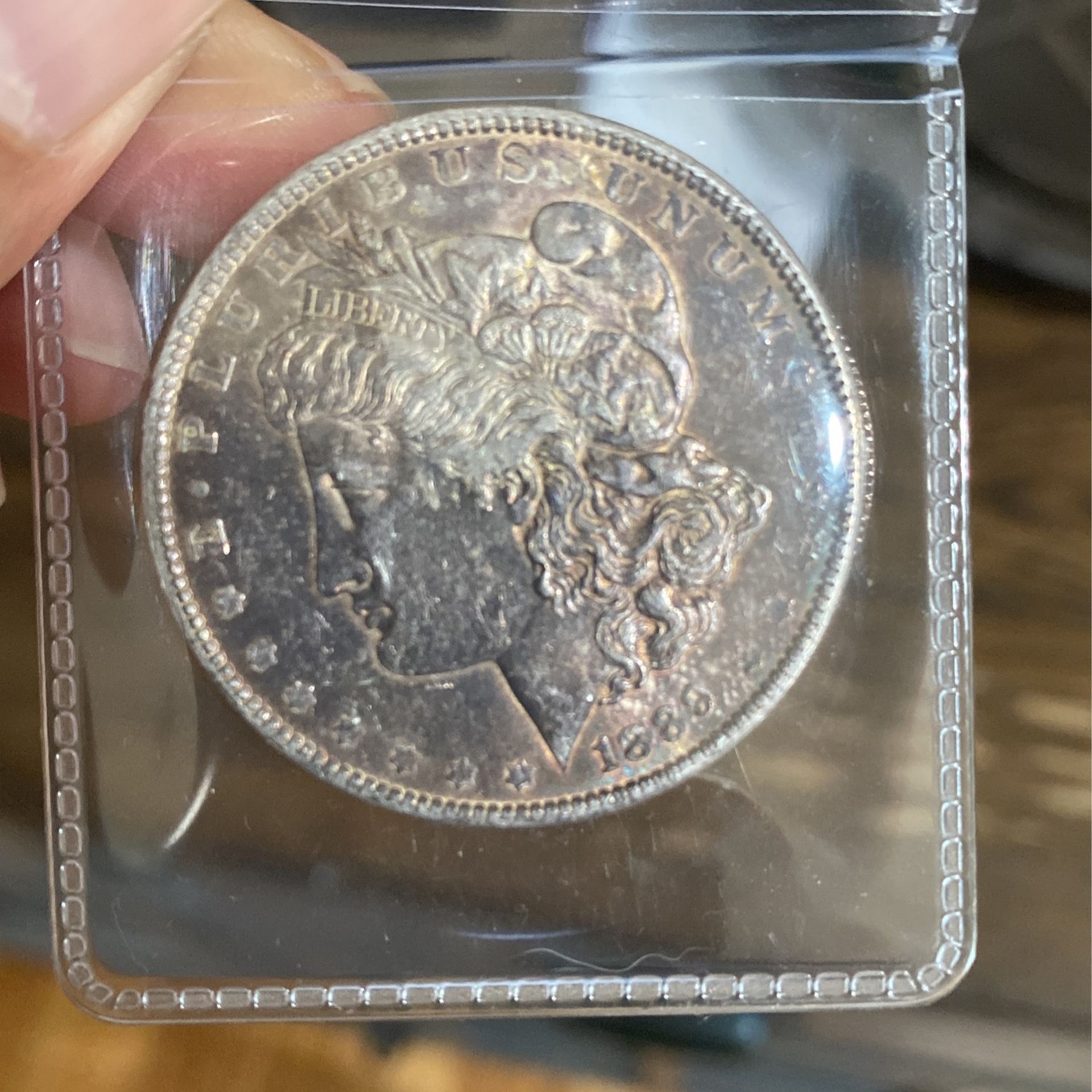 1889 silver Morgan, dollar coin