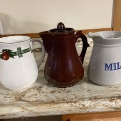 Three Country Style Pitchers