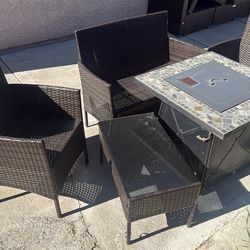 Patio chairs with fire pit