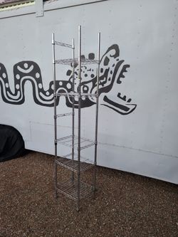 5 shelf corner metro rack 20"x12"x7ft located at 39th Ave and dunlap in phoenix off i17 Still up still got