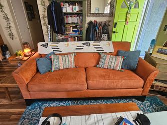 Orange mid century sofa