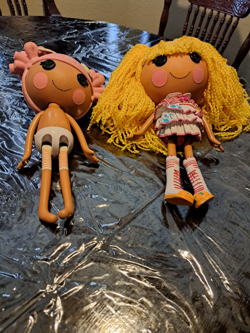 2 Lalaloopsy Dolls 12” ea. 1 Yellow Yarn Hair w/Dress and boots-1 plastic pink hair no clothing. Both for $15