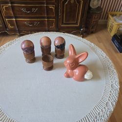 3 Painted eggs with wooden holders