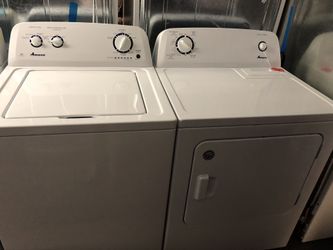 Used Amana washer and dryer set. 1 year warranty