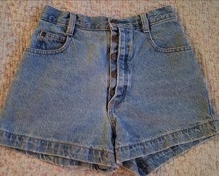 FOR SALE 
Vintage BONJOUR high-waisted denim shorts featuring a distinctive five-button fly closure. 
Waist measures 24".